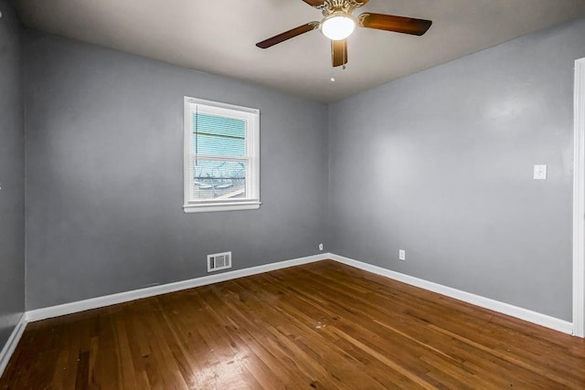 unfurnished room featuring ceiling fan and hardwood / wood-style floors