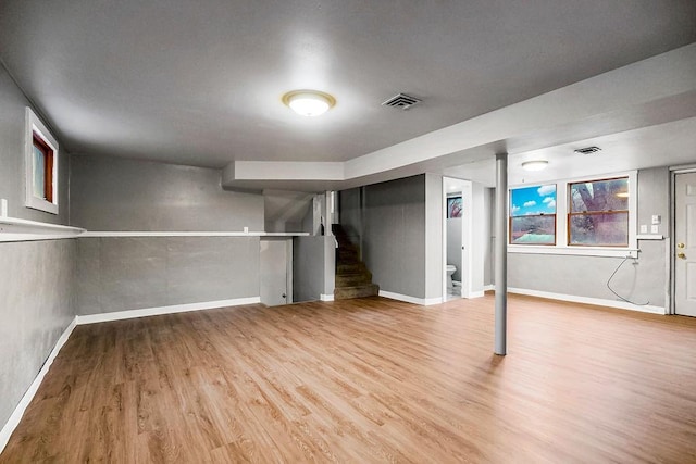 basement with light wood-type flooring