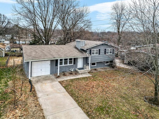 split level home featuring a garage