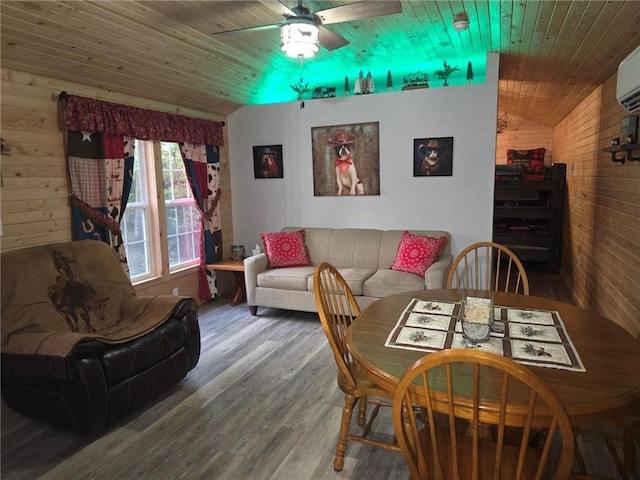 dining room with hardwood / wood-style floors, vaulted ceiling, ceiling fan, and wood ceiling