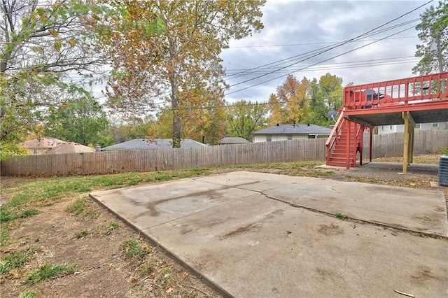 view of patio / terrace featuring central air condition unit and a deck