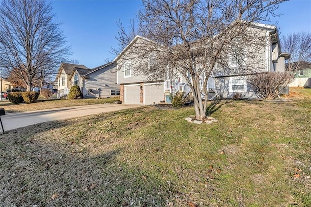 exterior space with a lawn and a garage