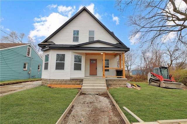 bungalow-style house with covered porch and a front yard