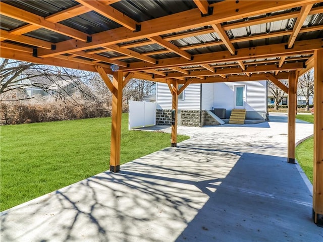 411 Charles, Warrensburg, MO 64093 - view of patio / terrace with a carport and entry steps