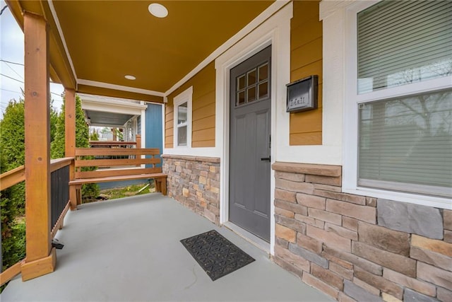 property entrance with a porch