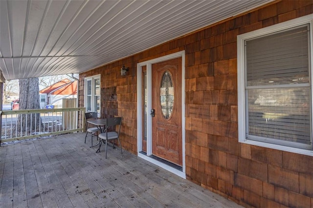 entrance to property with a porch