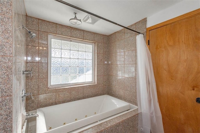 bathroom with shower / bath combo