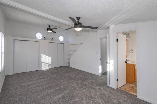 interior space with carpet and a textured ceiling