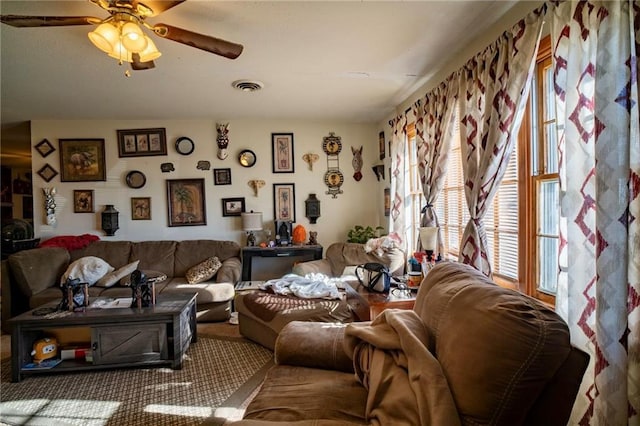 living room featuring ceiling fan