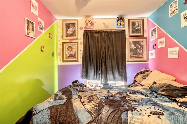 bedroom with vaulted ceiling