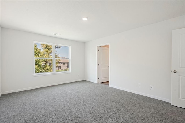 unfurnished room with carpet