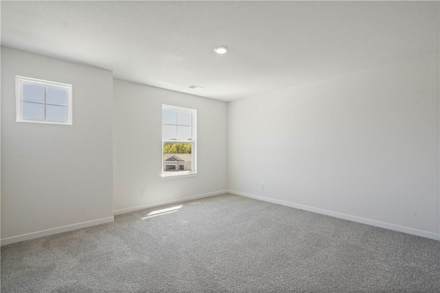 view of carpeted spare room