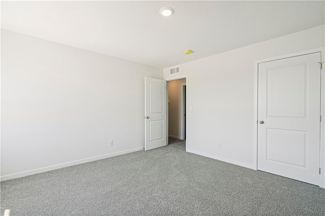 unfurnished bedroom featuring carpet flooring