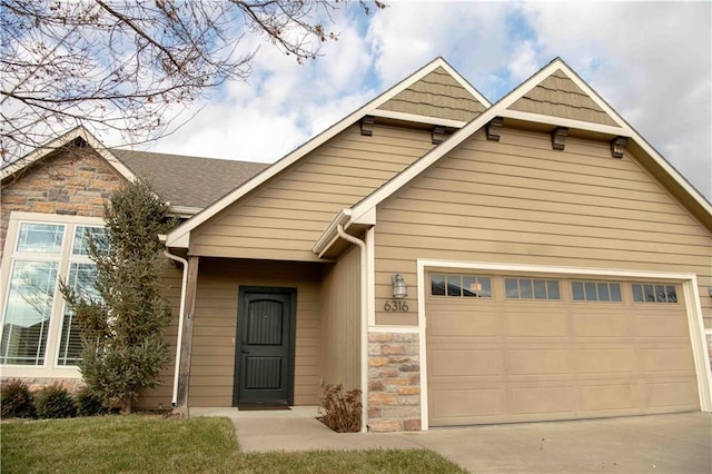 view of front of property featuring a garage