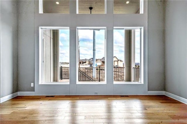 interior space with a wealth of natural light and light wood-type flooring