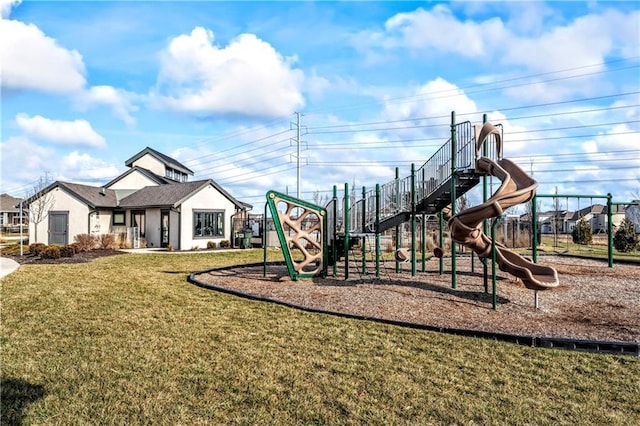 view of playground with a lawn