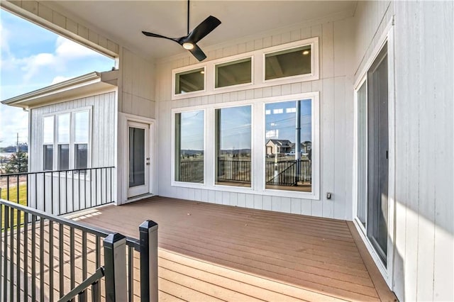 wooden deck with ceiling fan