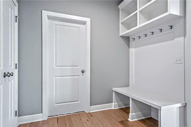 mudroom with light hardwood / wood-style flooring