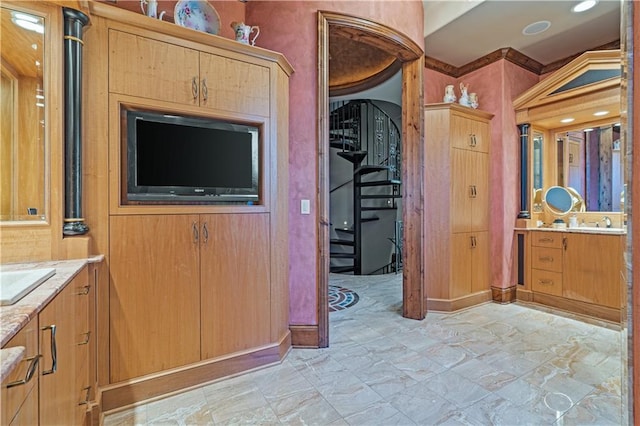 472 N Winnebago Dr, Lake Winnebago, MO 64034 - bathroom with vanity, baseboards, a closet, and stone finish flooring