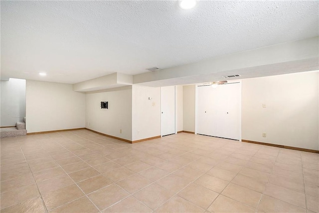 empty room with a textured ceiling