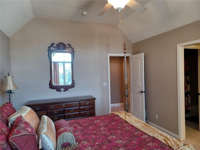 carpeted bedroom with lofted ceiling, ceiling fan, and baseboards