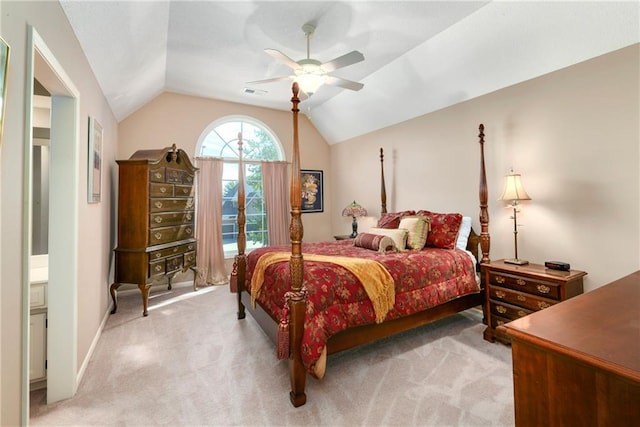 bedroom featuring a ceiling fan, light carpet, vaulted ceiling, and visible vents