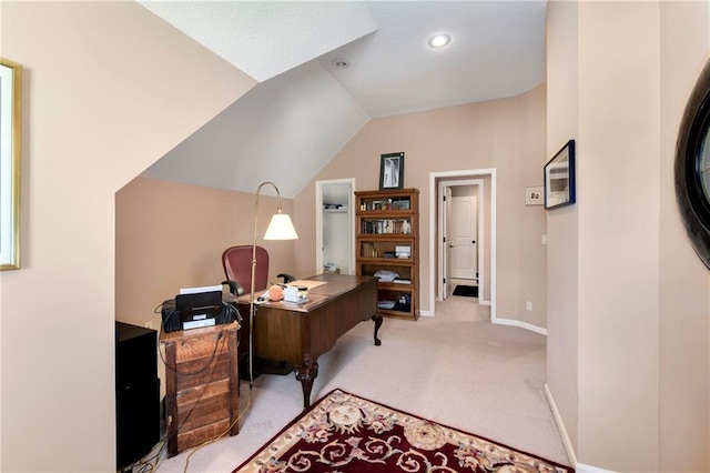 office featuring carpet, baseboards, and vaulted ceiling