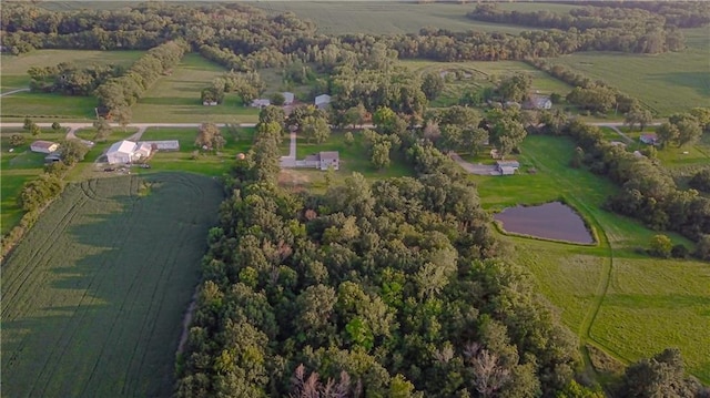 drone / aerial view with a water view and a rural view