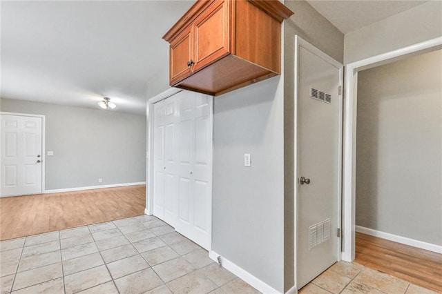 kitchen with light tile patterned floors