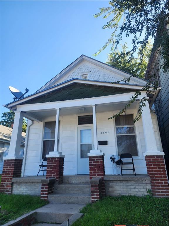 bungalow-style home with a porch