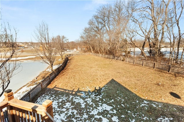 view of yard layered in snow