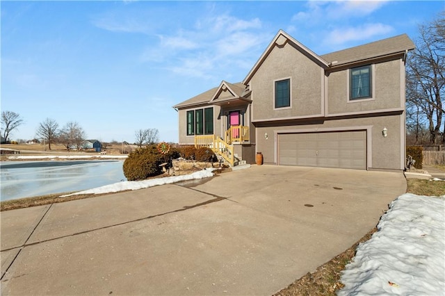 view of front of home with a garage