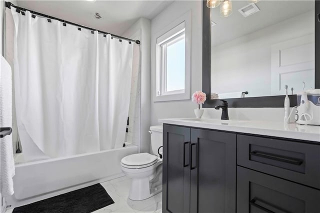 full bathroom with vanity, toilet, and shower / bath combo