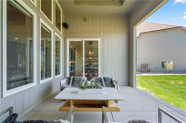 view of patio with central AC unit and outdoor lounge area