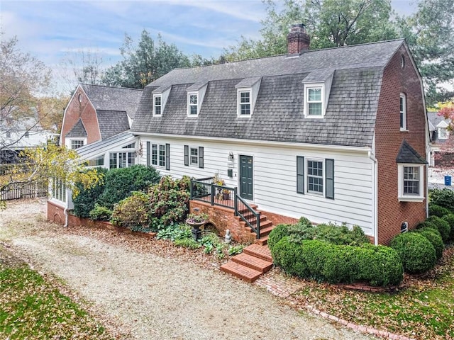 view of front of home featuring a wooden deck