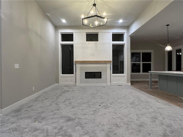 unfurnished living room with carpet