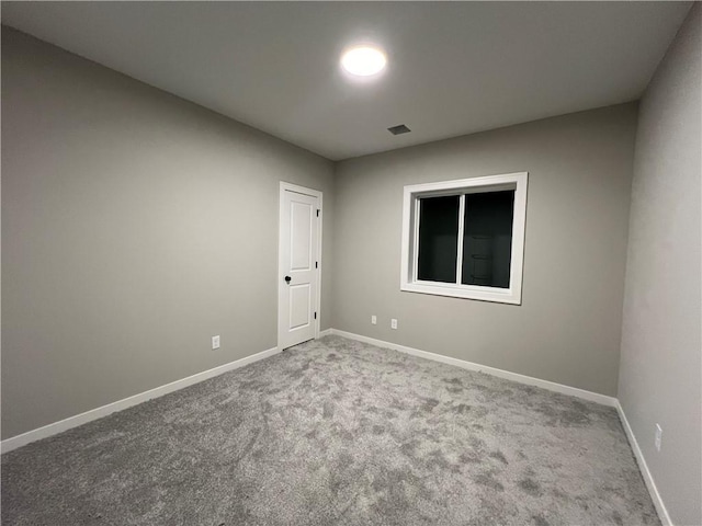 empty room featuring carpet