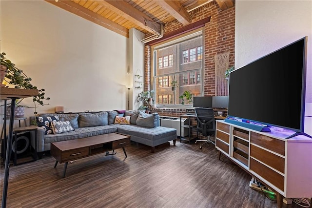 living room with beamed ceiling, wood ceiling, a high ceiling, and wood finished floors