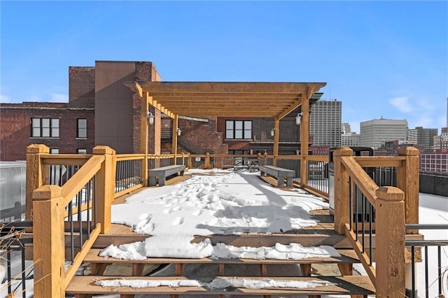 view of snow covered deck