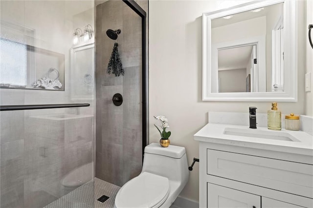 bathroom with vanity, toilet, and an enclosed shower