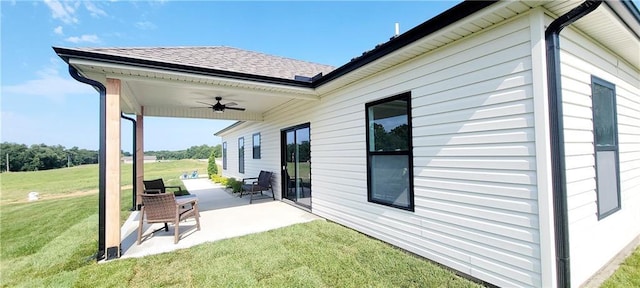 exterior space featuring ceiling fan