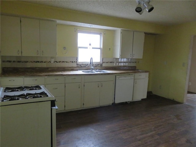 kitchen featuring sink, a textured ceiling, white appliances, decorative backsplash, and white cabinets