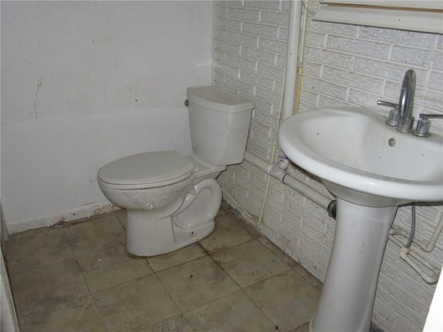 bathroom with toilet and sink