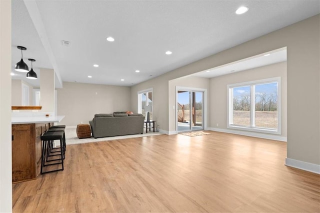 living room with light hardwood / wood-style floors