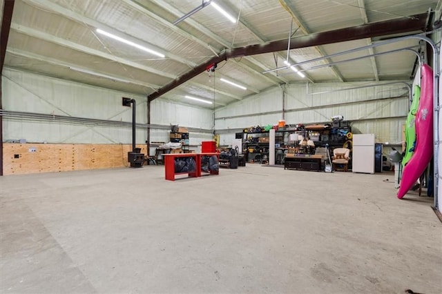 garage featuring white fridge