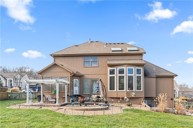 back of house with a patio area, fence, a lawn, and a pergola