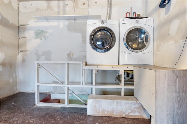 laundry room with washer and dryer