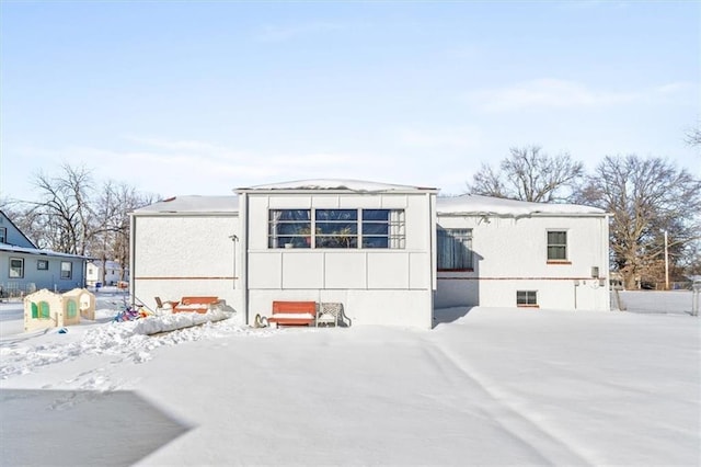 view of snow covered property