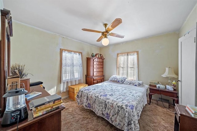 bedroom featuring carpet and ceiling fan