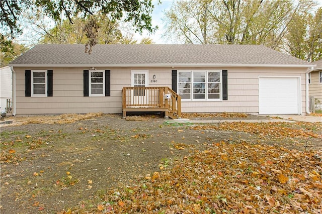 single story home featuring a wooden deck